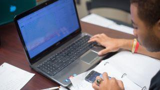 Eberhardt Student working on a laptop